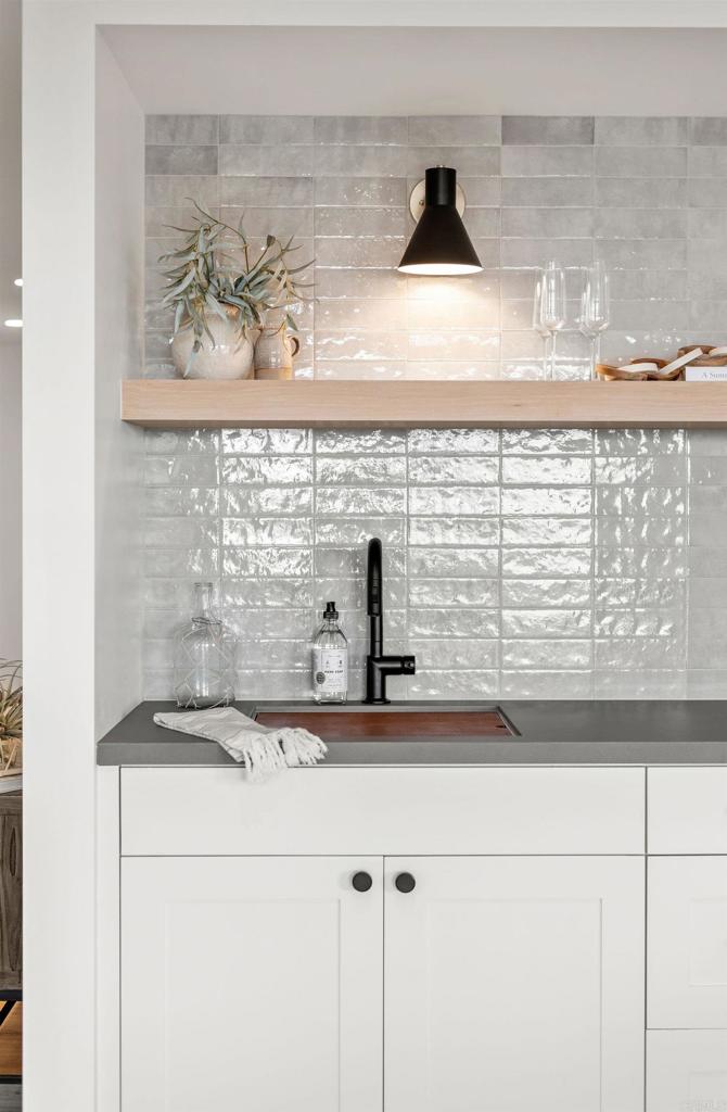 2172 Oxford Avenue Cardiff-by-the-Sea, CA 92007 - Photo 57 of 68 a bathroom with a sink and a granite counter tops