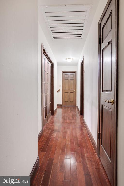 936 Grace Road Huntingtown, MD 20639 - Photo 43 of 64 a view of hallway with wooden floor
