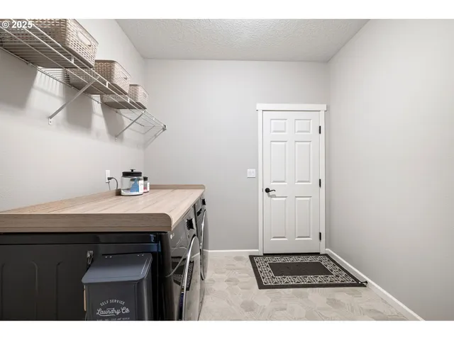 a bathroom with a sink double vanity granite and a mirror