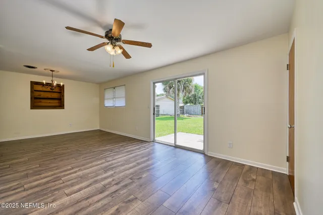 a view of an empty room and window