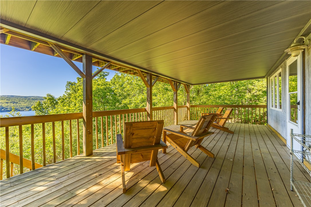 198 East Lake Road Middlesex, NY 14544 - Photo 28 of 50 LOWER LEVEL DECK WITH AMAZING LAKE VIEWS