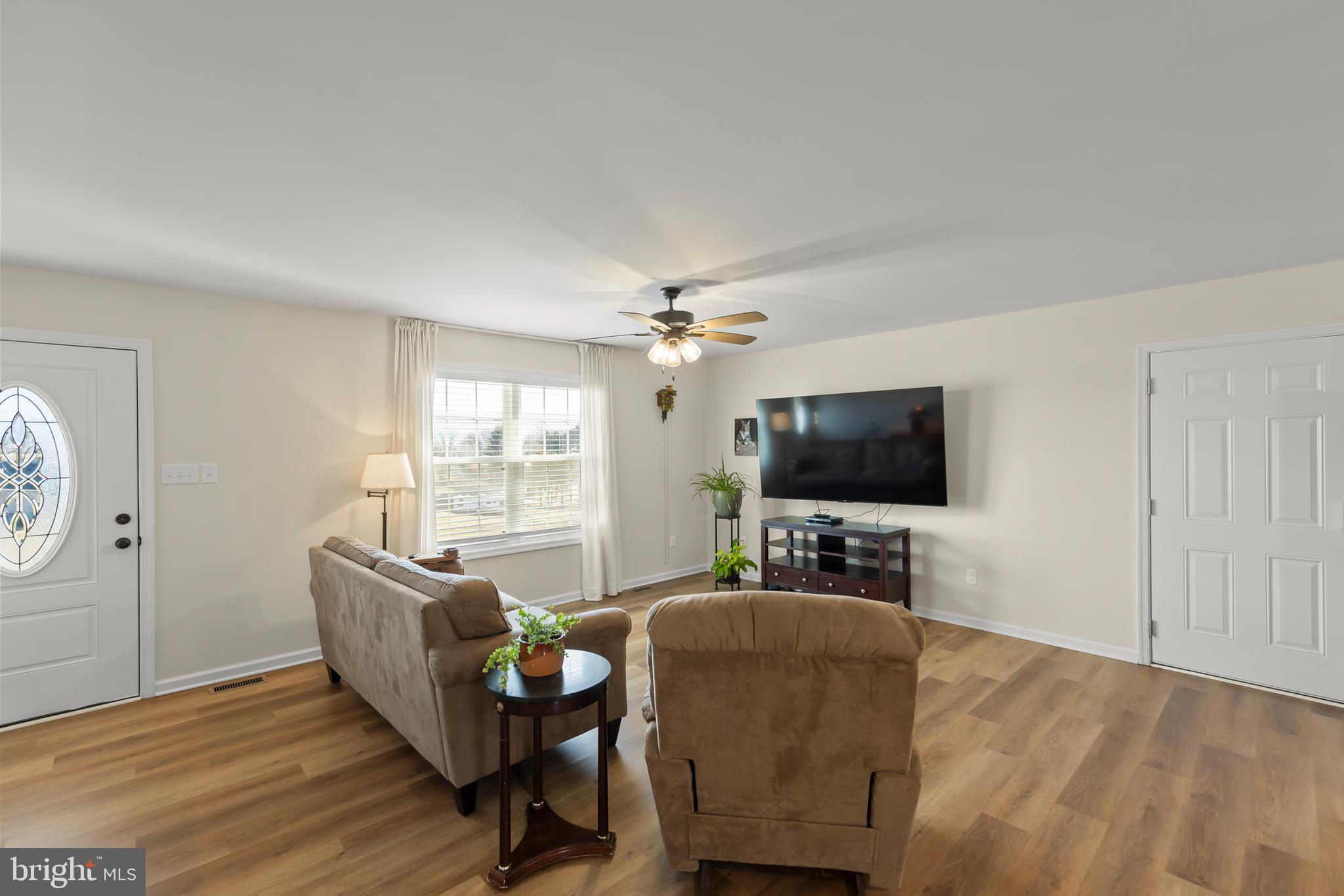 4009 Ridge Road Quicksburg, VA 22847 - Photo 10 of 41 a living room with furniture and a flat screen tv