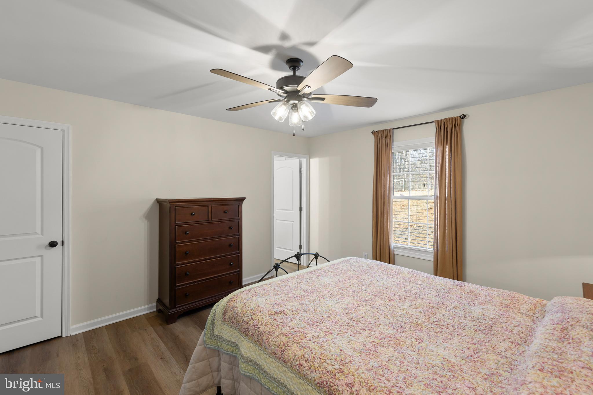 4009 Ridge Road Quicksburg, VA 22847 - Photo 16 of 41 a bedroom with a bed and a dresser