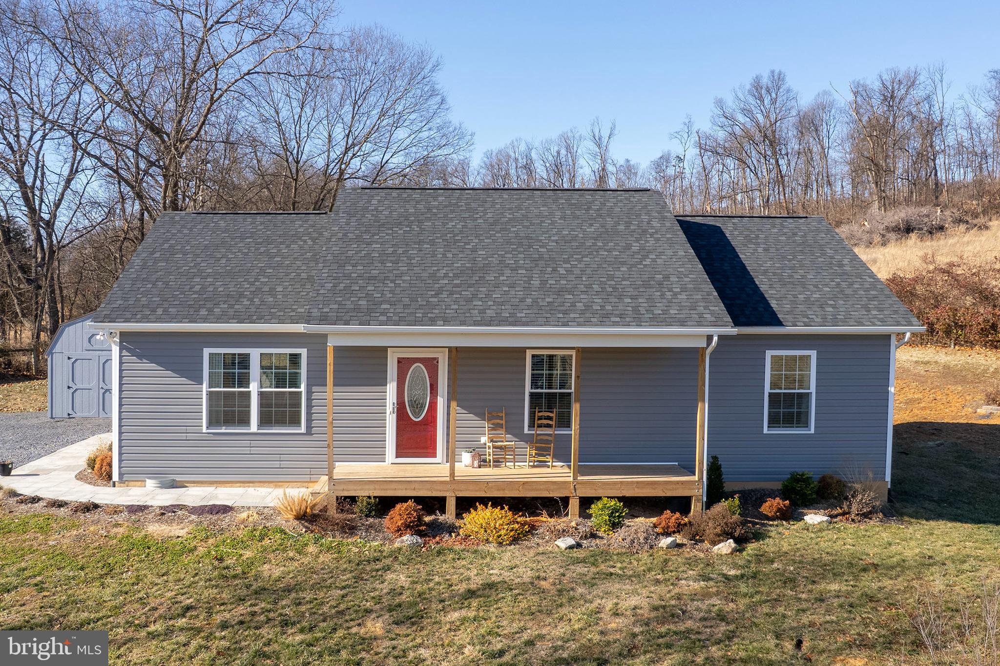 4009 Ridge Road Quicksburg, VA 22847 - Photo 2 of 41 front view of a house with a yard