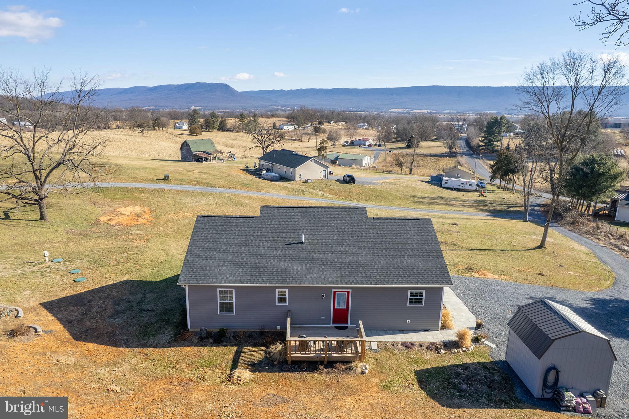 4009 Ridge Road Quicksburg, VA 22847 - Photo 38 of 41 a view of a swimming pool with a table and chairs