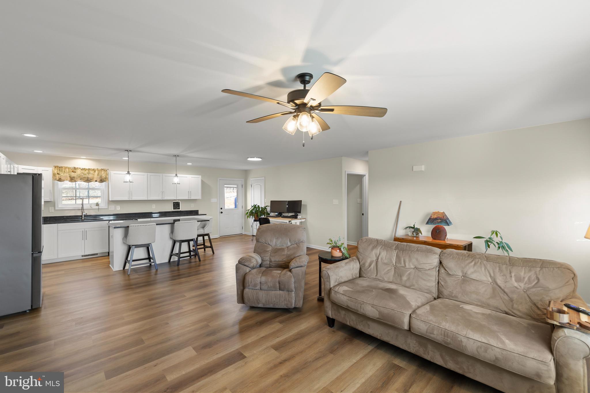 4009 Ridge Road Quicksburg, VA 22847 - Photo 9 of 41 a living room with furniture and kitchen view