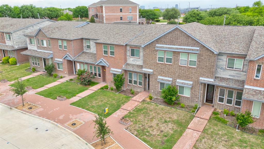 6043 Rivendell Drive Frisco, TX 75035 - Photo 34 of 38 a aerial view of a brick house next to a yard