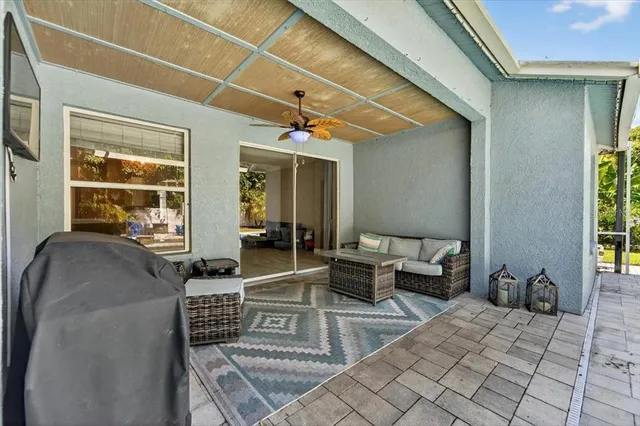 a view of a swimming pool with a yard