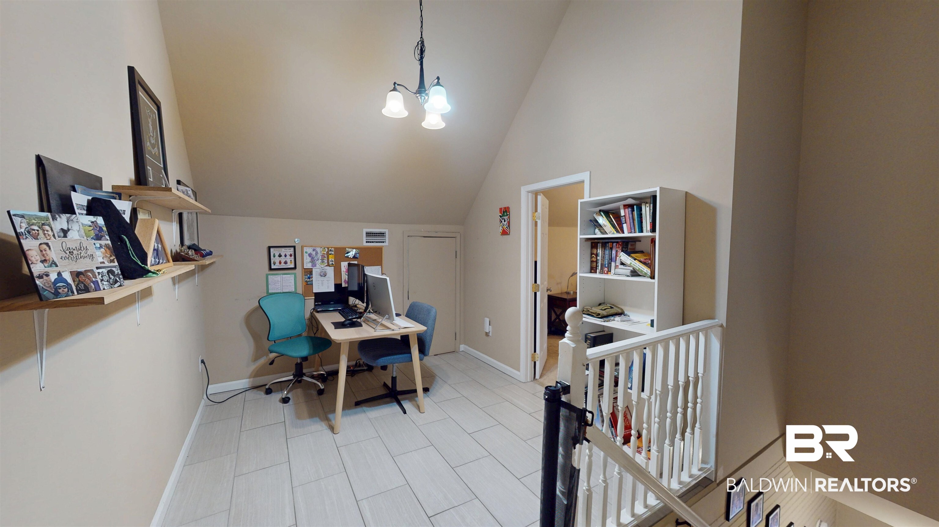 1154 New St Francis Street Mobile, AL 36604 - Photo 25 of 37 Home office with a notable chandelier, baseboards, and high vaulted ceiling