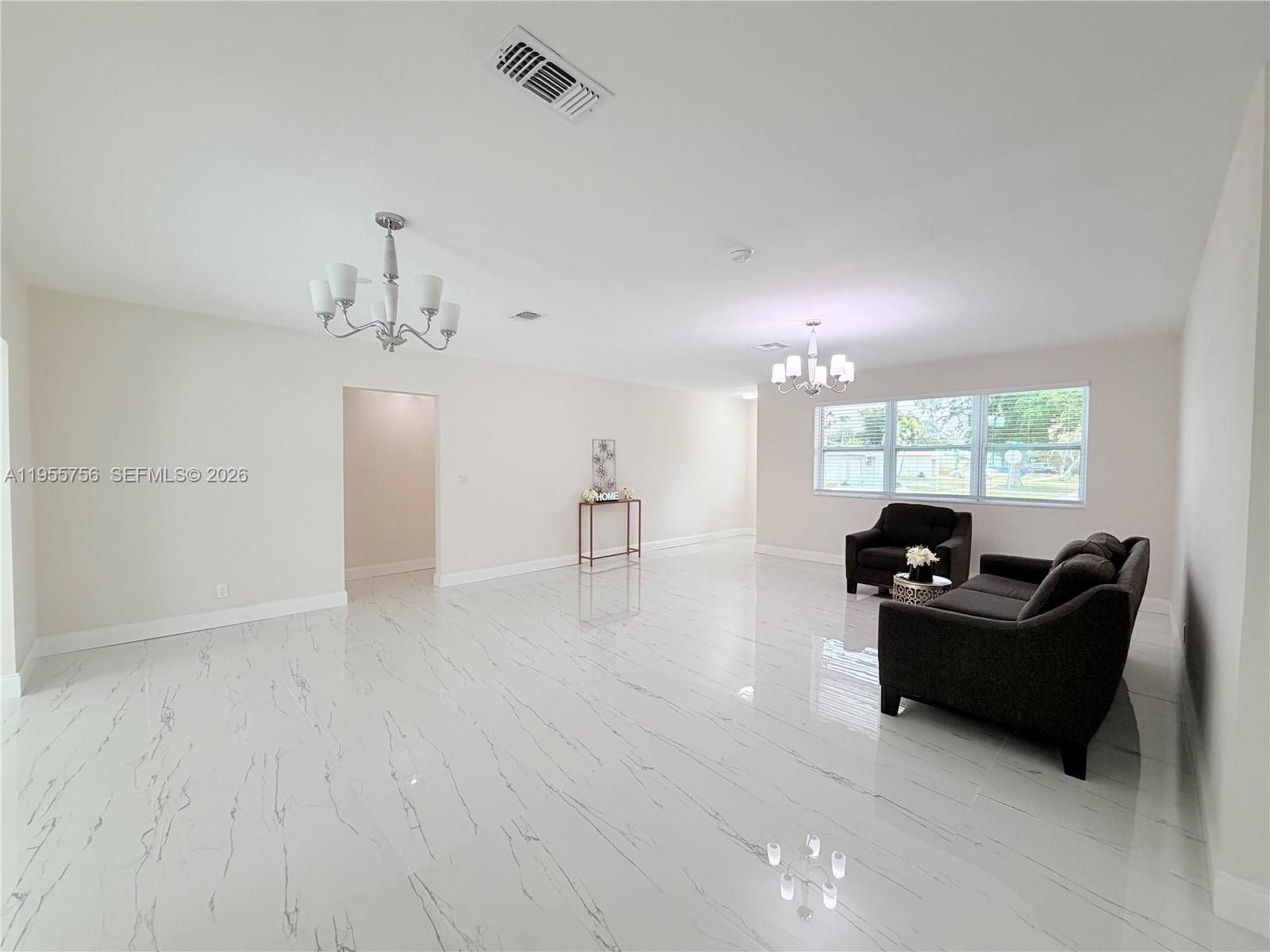 4241 Thomas Street Hollywood, FL 33021 - Photo 15 of 91 a living room with furniture and wooden floor