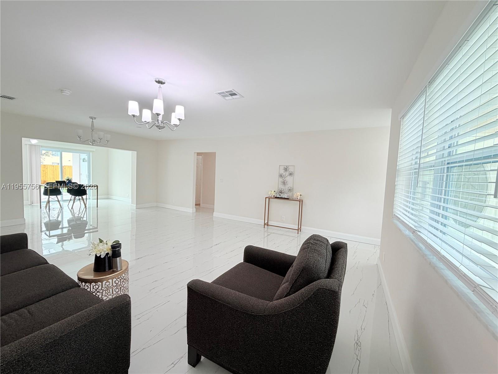 4241 Thomas Street Hollywood, FL 33021 - Photo 17 of 91 a living room with furniture