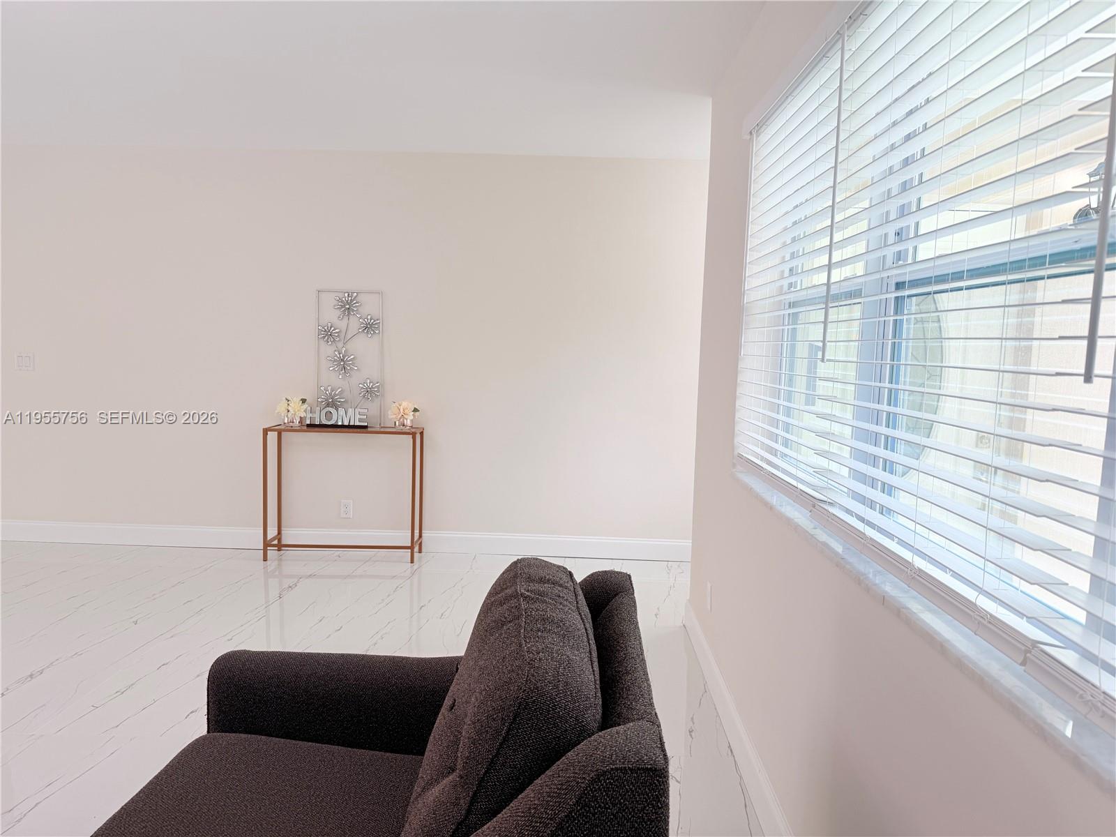 4241 Thomas Street Hollywood, FL 33021 - Photo 18 of 91 a living room with furniture and a window