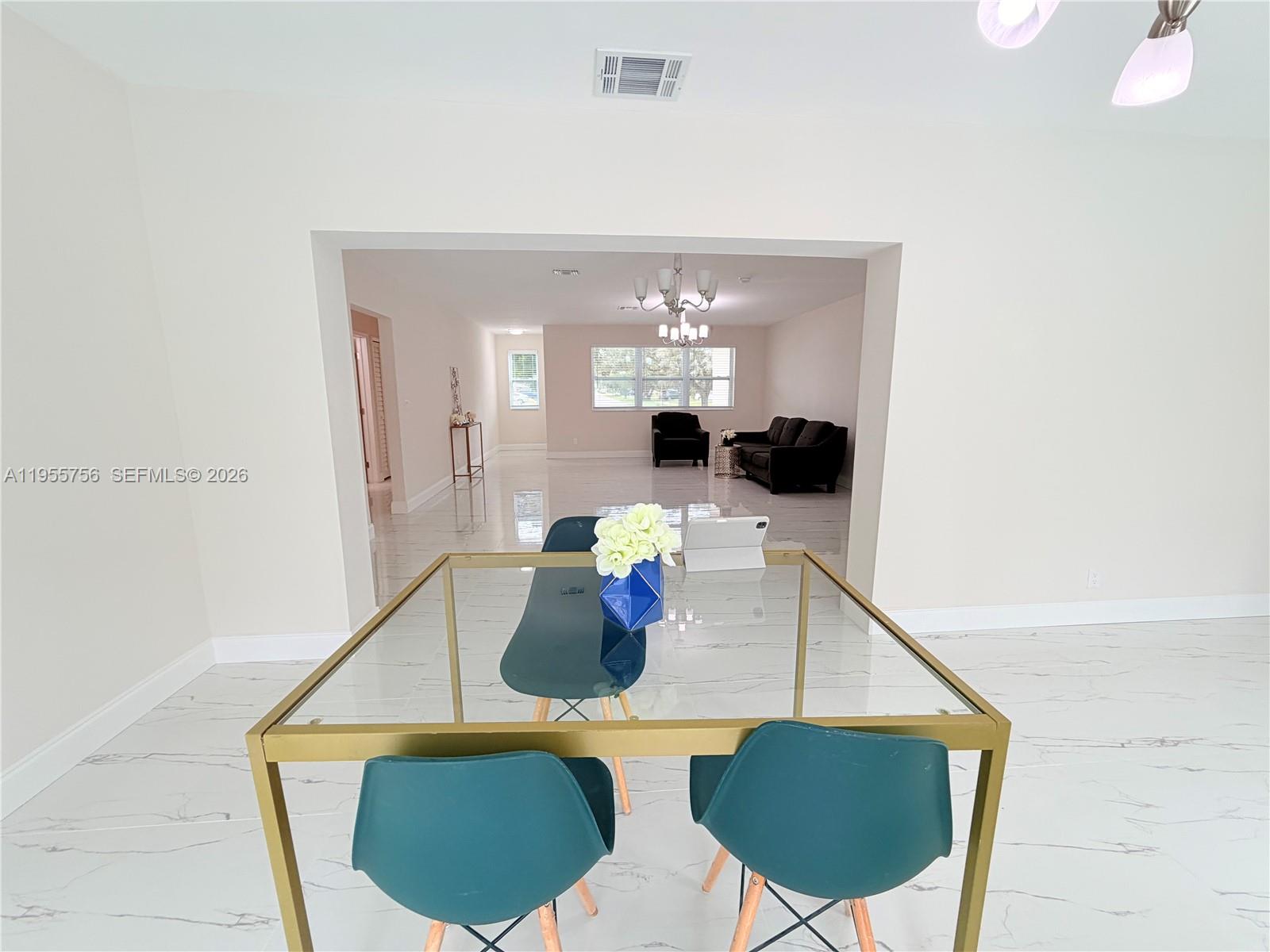 4241 Thomas Street Hollywood, FL 33021 - Photo 23 of 91 a view of living room with furniture and wooden floor