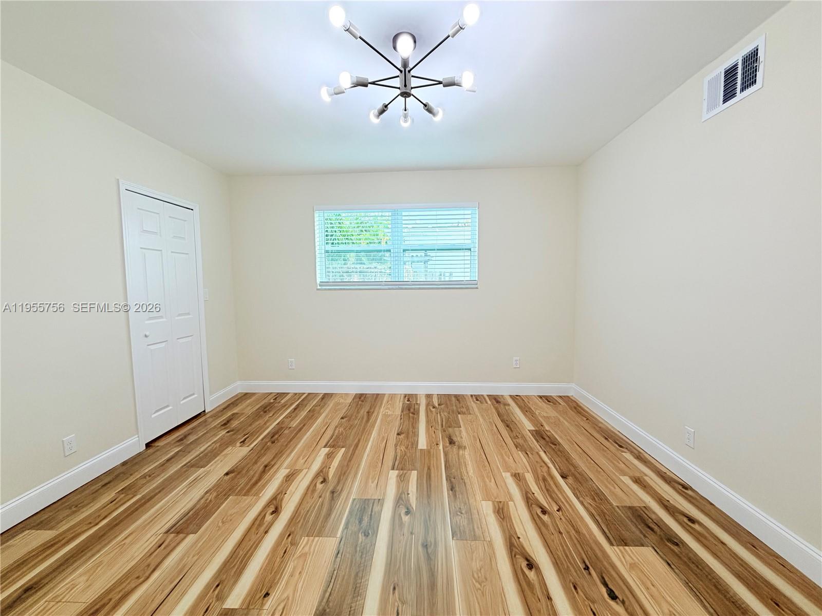 4241 Thomas Street Hollywood, FL 33021 - Photo 43 of 91 a view of room with a ceiling fan and window