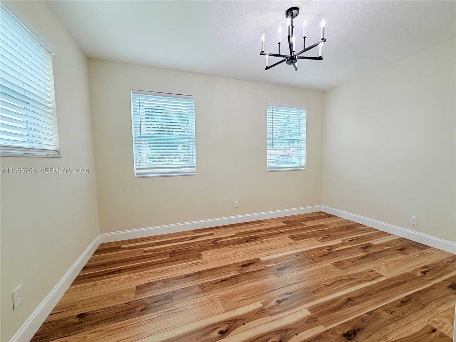4241 Thomas Street Hollywood, FL 33021 - Photo 59 of 91 a view of empty room with window and ceiling fan
