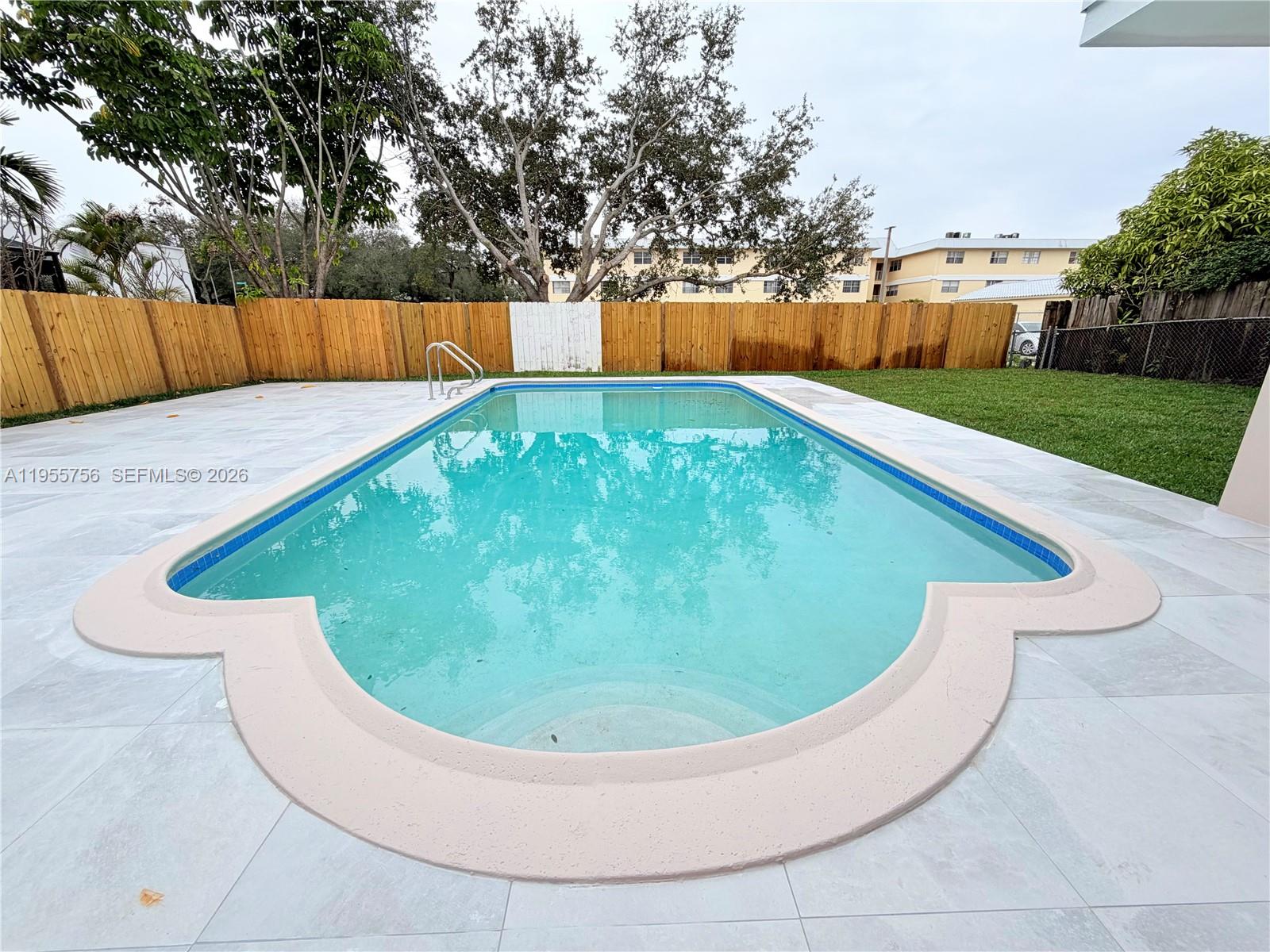 4241 Thomas Street Hollywood, FL 33021 - Photo 71 of 91 a view of swimming pool with a yard