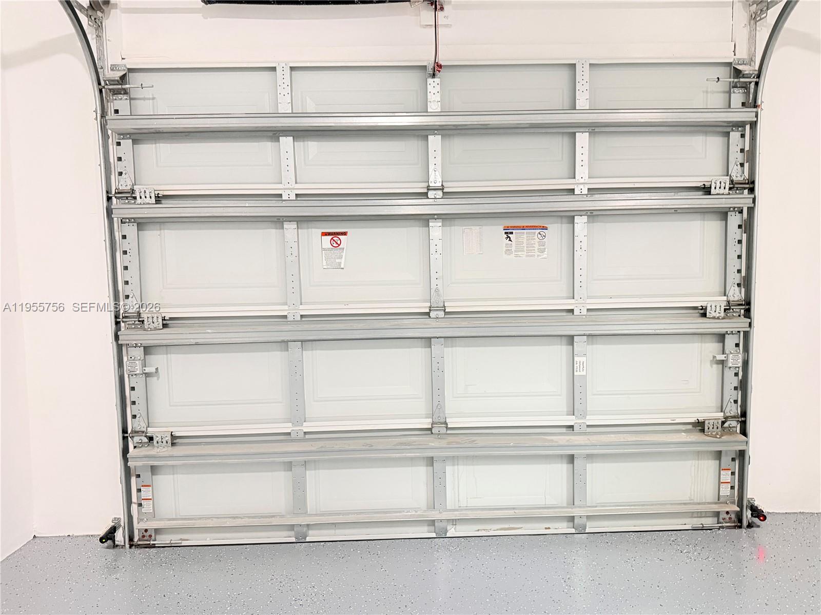 4241 Thomas Street Hollywood, FL 33021 - Photo 78 of 91 a view of a room with rack on the wall