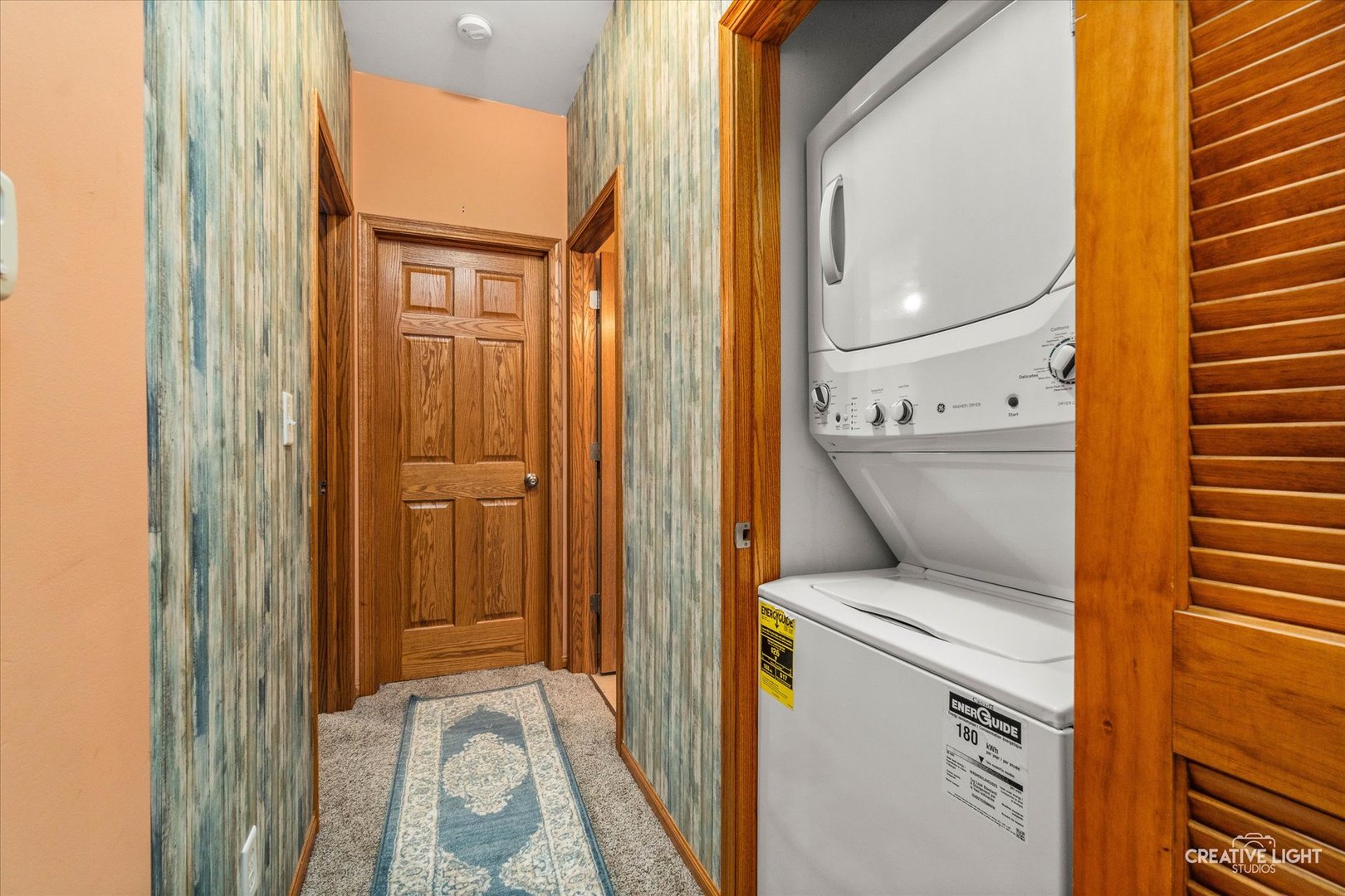 575 North Strack Street, Unit 103 Cortland, IL 60112 - Photo 5 of 11 a utility room with dryer and washer