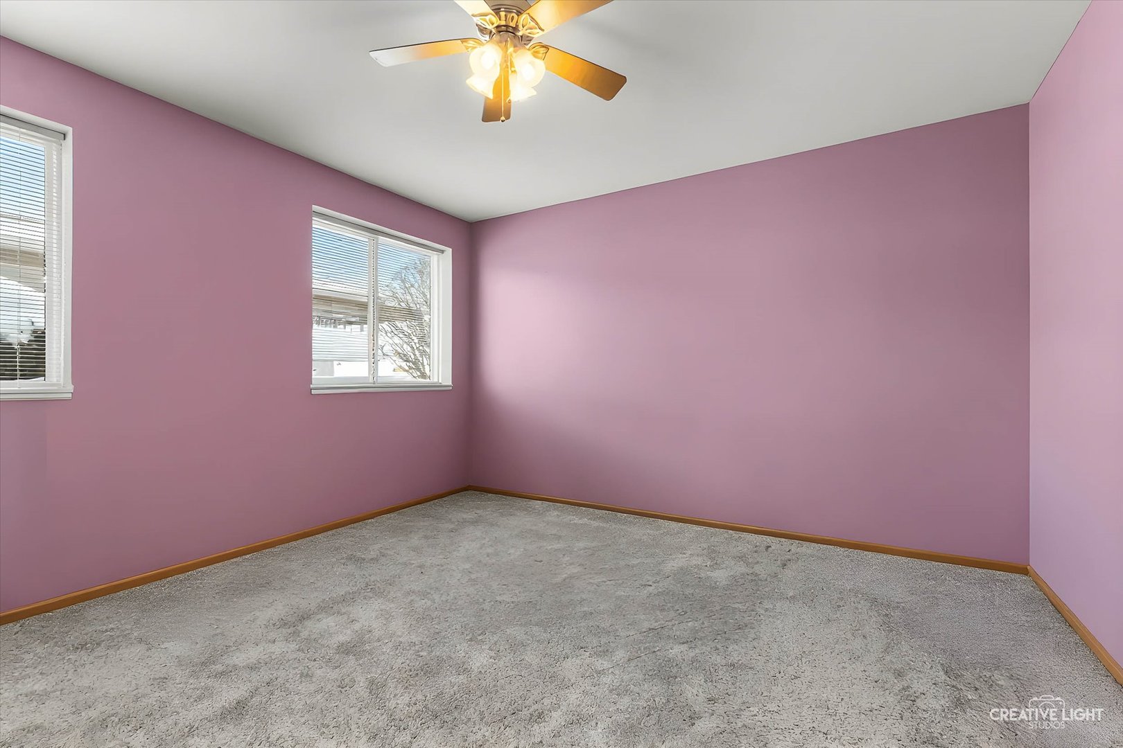 575 North Strack Street, Unit 103 Cortland, IL 60112 - Photo 7 of 11 an empty room with windows