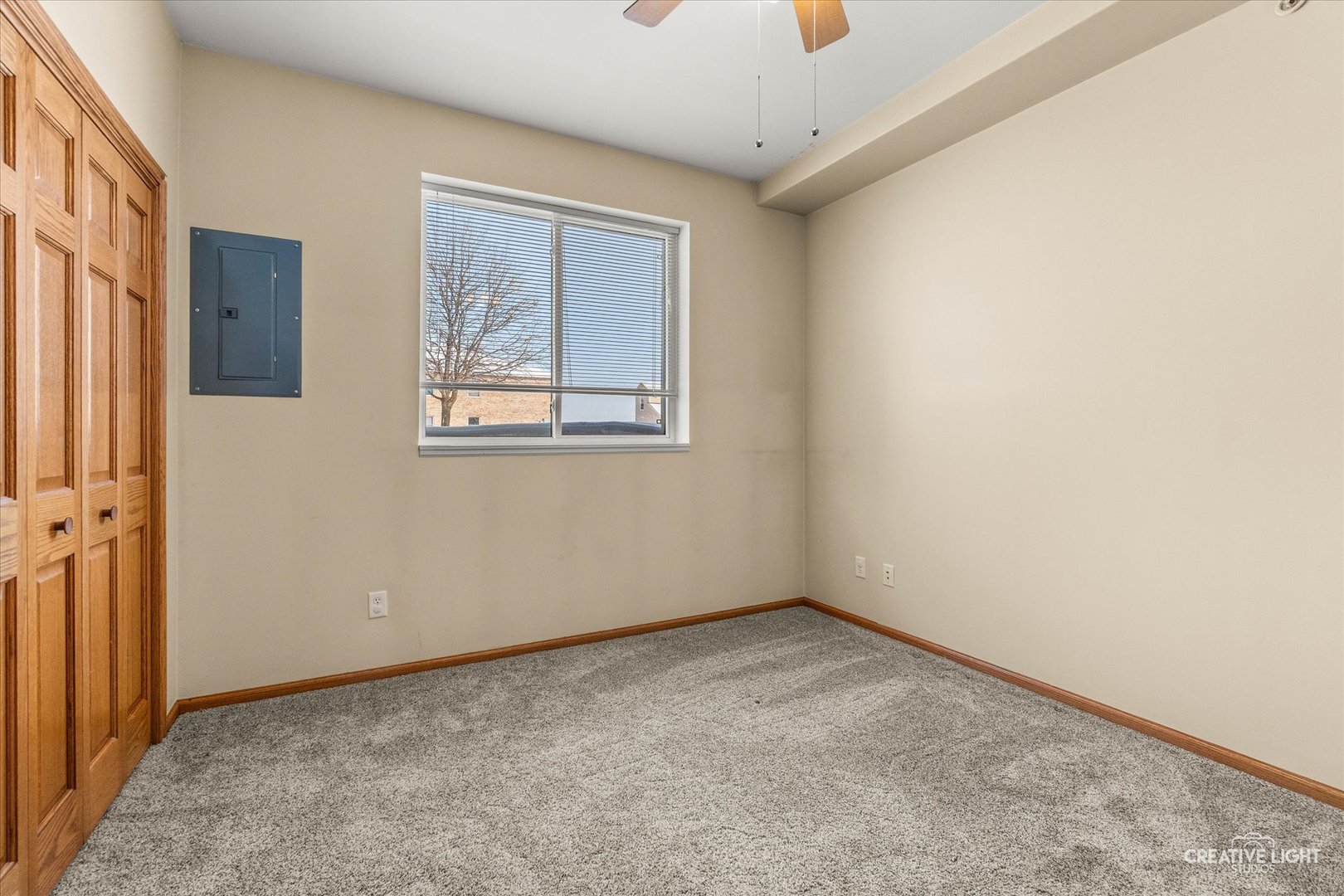 575 North Strack Street, Unit 103 Cortland, IL 60112 - Photo 9 of 11 an empty room with windows