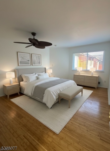 250 Ridgedale Avenue, Unit B 8 Florham Park, NJ 07932 - Photo 8 of 19 a bedroom with a large bed and a window