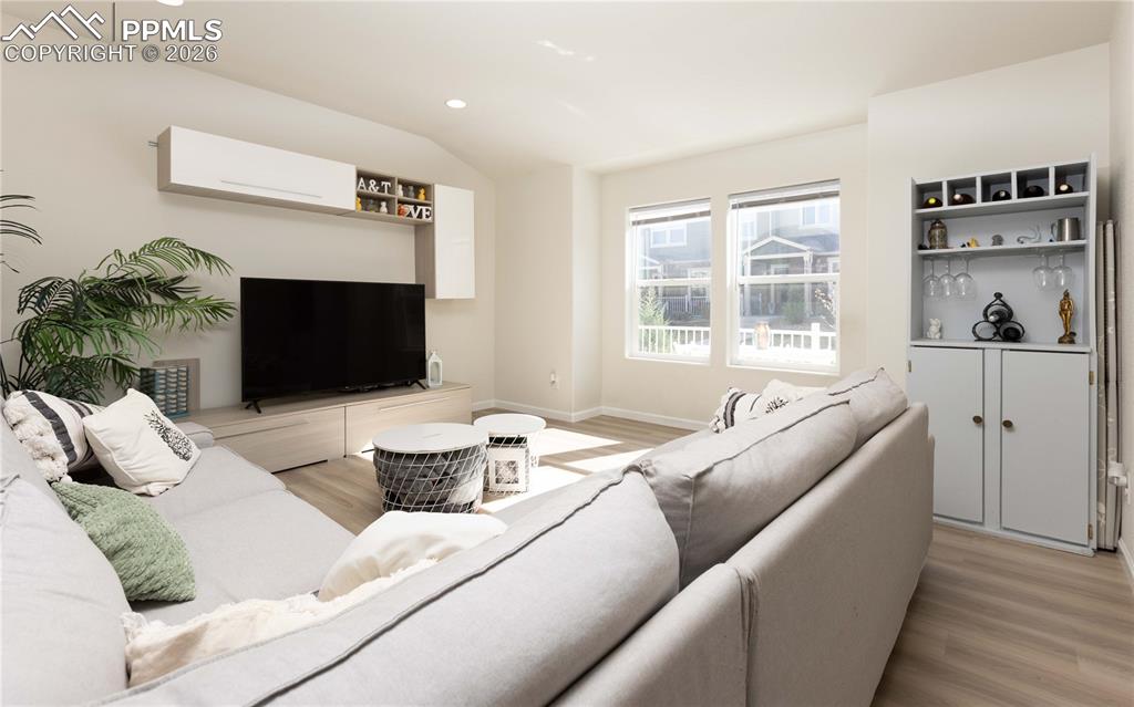 4031 Samaritan Loop Colorado Springs, CO 80916 - Photo 19 of 34 a living room with furniture and a fireplace