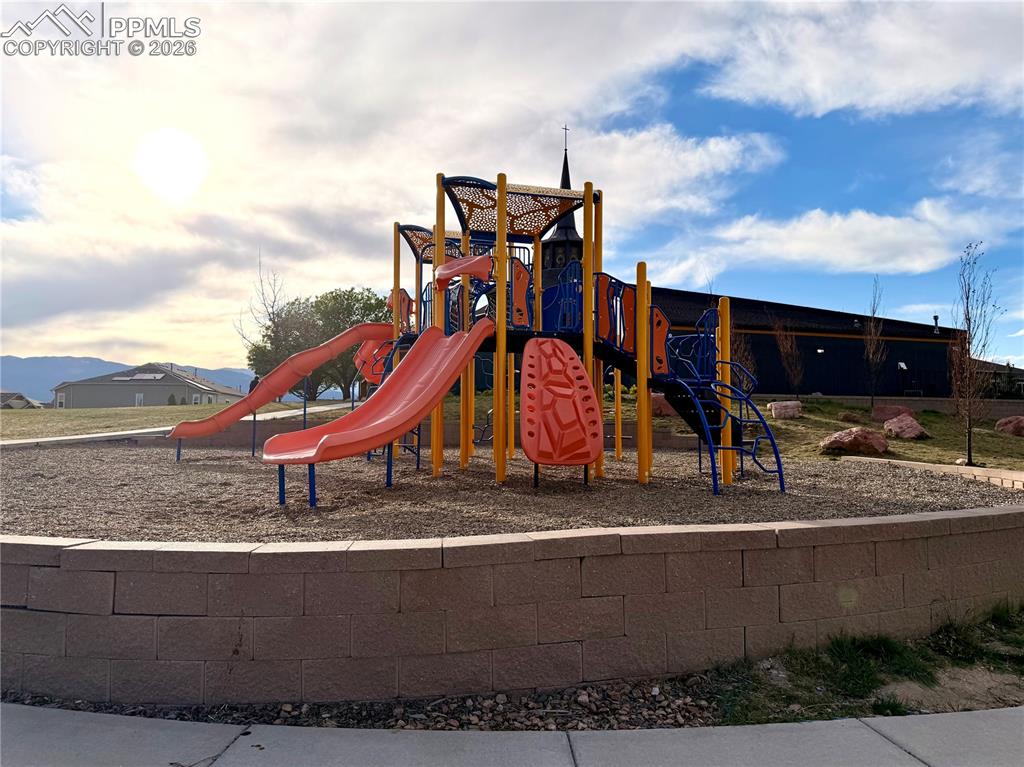 4031 Samaritan Loop Colorado Springs, CO 80916 - Photo 31 of 34 a play ground with the view of the terrace