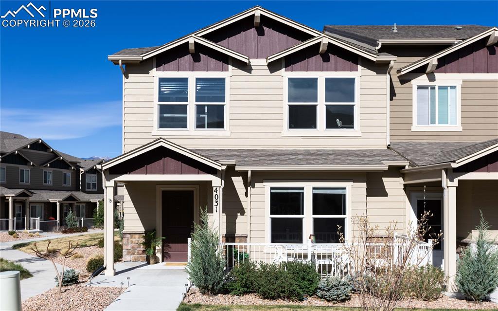 4031 Samaritan Loop Colorado Springs, CO 80916 - Photo 34 of 34 a front view of a house with a yard