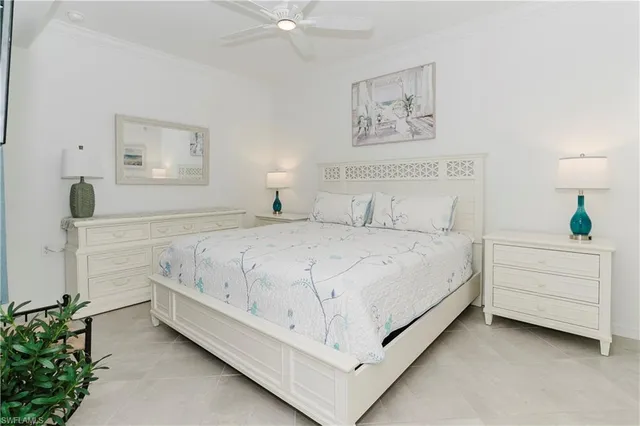 a bed room with a bed and a window