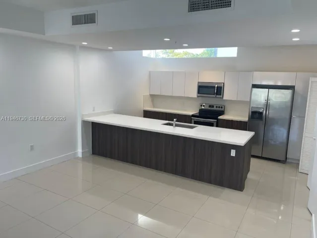 a view of street and electric pole