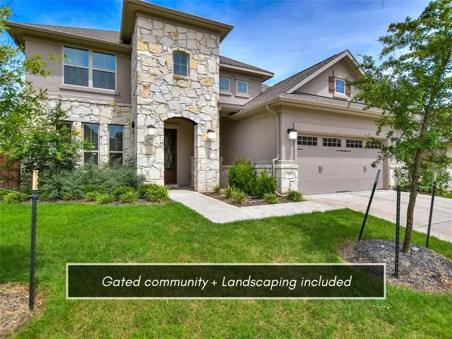 a view of house with front yard