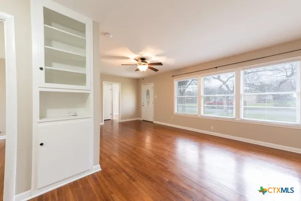 a view of livingroom with hardwood floor and window
