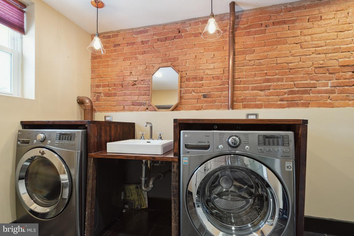 3359 Falls Road Baltimore, MD 21211 - Photo 19 of 19 LG washer & dryer conveniently in bathroom