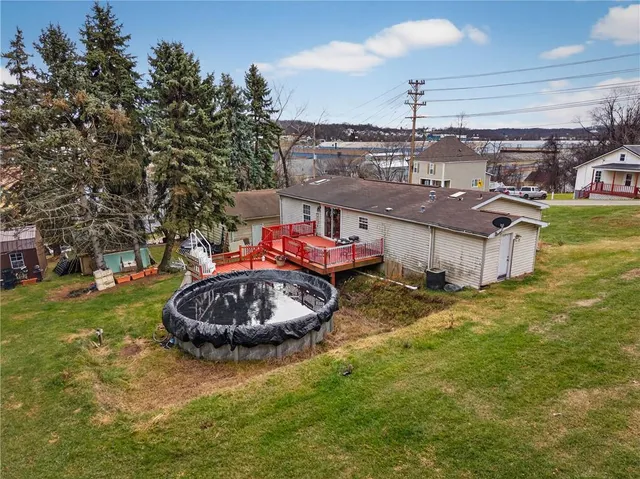 an aerial view of a house with a garden