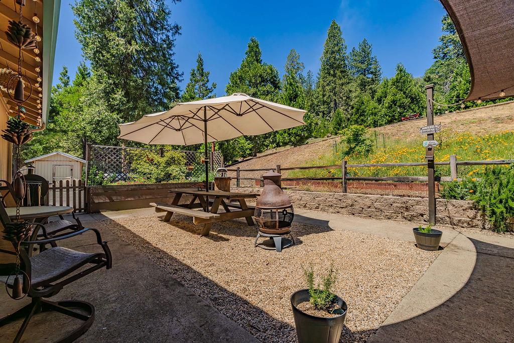 26845 Spring Court Pioneer, CA 95666 - Photo 68 of 89 an outdoor space with furniture and umbrella