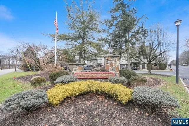 a view of a garden with a tree