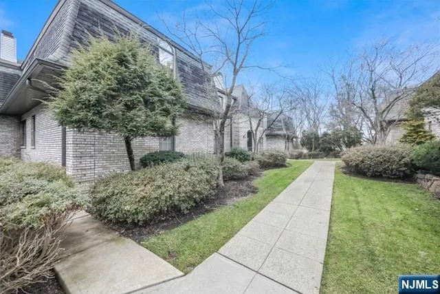 a view of a bathroom with a glass door