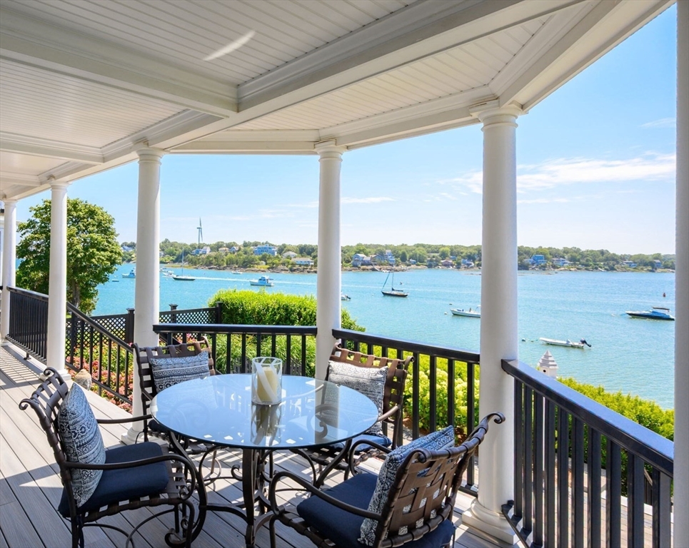 67 Hampton Circle Hull, MA 02045 - Photo 14 of 30 a view of a city from a dining room with a table and chairs