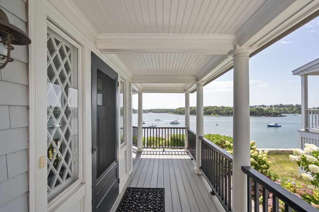 67 Hampton Circle Hull, MA 02045 - Photo 2 of 30 a view of a balcony with wooden floor