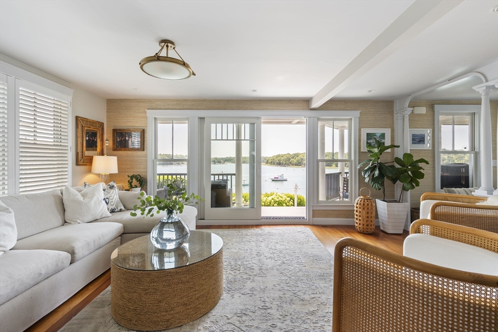67 Hampton Circle Hull, MA 02045 - Photo 3 of 30 a living room with furniture and a large window