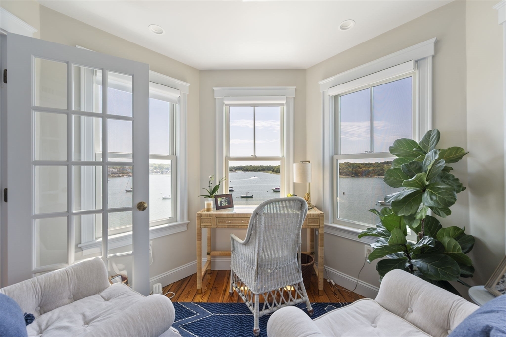 67 Hampton Circle Hull, MA 02045 - Photo 7 of 30 a living room with furniture and a potted plant
