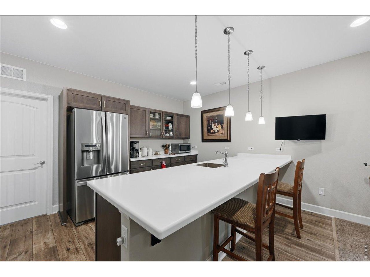 997 Blue Bell Road Berthoud, CO 80513 - Photo 27 of 50 Basement kitchenette is an incredible feature... refrigerator stays!
