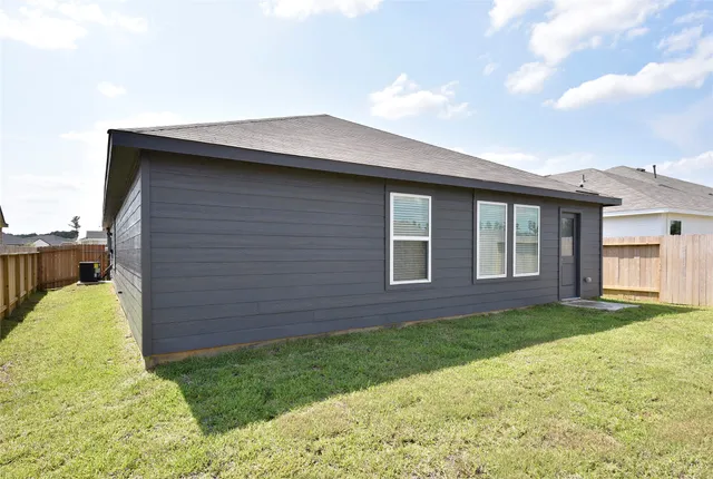 a house view with a garden space