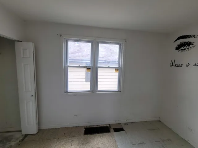 an empty room with a window