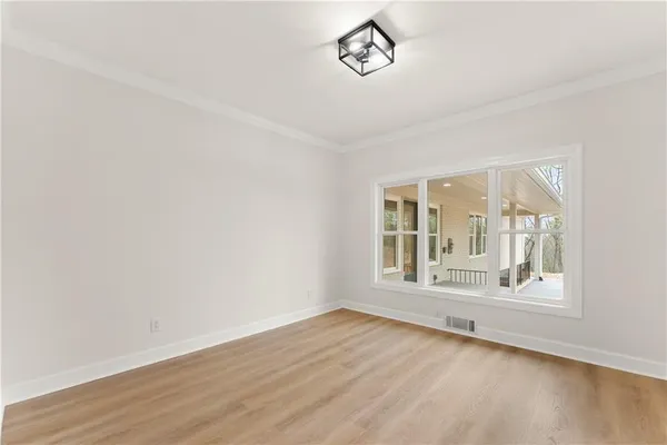 a view of a bathroom from a hallway