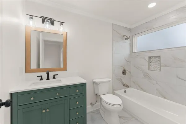 a view of a yard with a house in the background