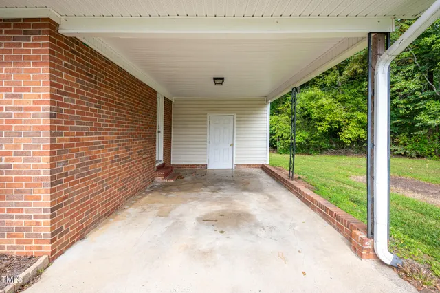 a view of a porch with a backyard