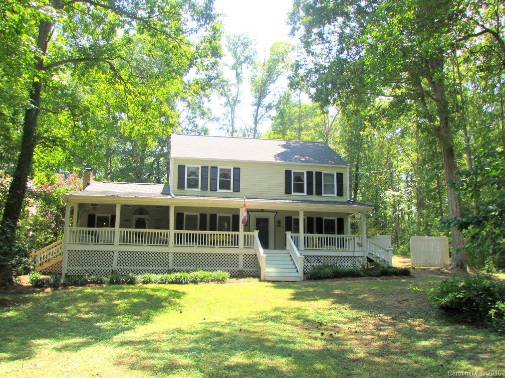 1515 Mallard Bay Road York, SC 29745 - Photo 1 of 24 a view of a house with a swimming pool