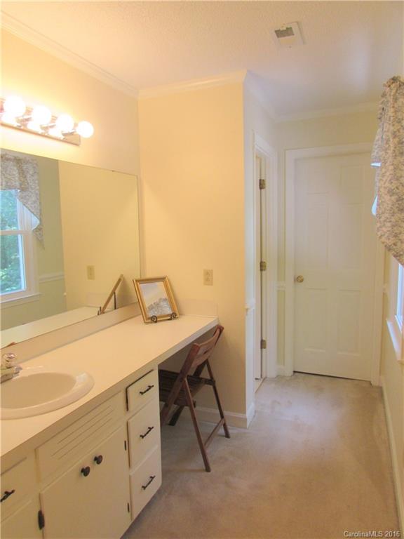 1515 Mallard Bay Road York, SC 29745 - Photo 12 of 24 a bathroom with a sink and a mirror