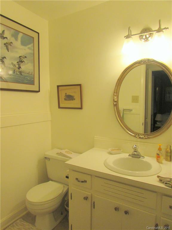 1515 Mallard Bay Road York, SC 29745 - Photo 14 of 24 a bathroom with a toilet sink and mirror
